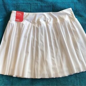 couple of tennis skirts in black and white ready to hit the court in style